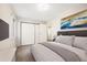 Inviting bedroom with a comfortable queen size bed, complemented by modern features at 3082 S Wheeling Way # 202, Aurora, CO 80014