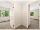 Hallway featuring doors to bedrooms and sunlight from windows at 3082 S Wheeling Way # 202, Aurora, CO 80014