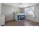 Cozy bedroom featuring a playful bunk bed and a ceiling fan at 9382 Lark Sparrow Dr, Highlands Ranch, CO 80126