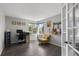 A bright home office with a large window allowing for great natural light at 9382 Lark Sparrow Dr, Highlands Ranch, CO 80126
