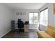A bright home office with a large window allowing for great natural light at 9382 Lark Sparrow Dr, Highlands Ranch, CO 80126
