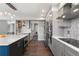 Stylish kitchen featuring stainless steel appliances, sleek cabinetry, and a functional layout for culinary enthusiasts at 9382 Lark Sparrow Dr, Highlands Ranch, CO 80126