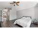 Spacious main bedroom with ensuite bathroom featuring modern decor at 9382 Lark Sparrow Dr, Highlands Ranch, CO 80126