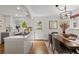 Modern kitchen and dining space with stainless appliances, and an inviting atmosphere at 400 Holly St, Denver, CO 80220