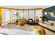 Spacious sun-filled living room with modern furnishings and designer decor accents at 4145 Dudley St, Wheat Ridge, CO 80033