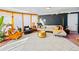 Open concept living area with modern decor, abundant natural light and stylish design features at 4145 Dudley St, Wheat Ridge, CO 80033