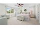 Airy main bedroom with lots of natural light, two windows and ample furnishings at 4830 Monarch Dr, Firestone, CO 80504