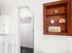 Modern bathroom with a glass-enclosed shower and built-in shelving at 3701 Eliot St, Denver, CO 80211