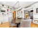 Elegant dining room featuring a modern chandelier and ample shelving at 3701 Eliot St, Denver, CO 80211