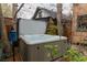 Inviting backyard hot tub offers a relaxing retreat amidst lush greenery at 3701 Eliot St, Denver, CO 80211
