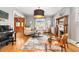 Comfortable living room with fireplace, hardwood floors, and lots of natural light at 3701 Eliot St, Denver, CO 80211