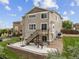 Two-story home with deck, patio, well-manicured lawn, and colorful landscaping at 3620 Sandoval St, Brighton, CO 80601
