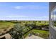 Expansive backyard featuring a patio, beautiful landscaping, and scenic views of the surrounding greenery at 3620 Sandoval St, Brighton, CO 80601
