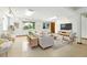 Cozy basement living area with comfortable seating and natural light, complete with a TV at 517 Rider Ridge Dr, Longmont, CO 80504