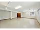 Finished basement featuring neutral colors, updated lighting and one window at 517 Rider Ridge Dr, Longmont, CO 80504