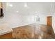Finished basement includes a kitchenette, closet and white walls at 517 Rider Ridge Dr, Longmont, CO 80504