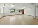Finished basement featuring neutral colors, updated lighting, and two windows at 517 Rider Ridge Dr, Longmont, CO 80504