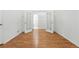 Bedroom with hardwood floors and french doors at 517 Rider Ridge Dr, Longmont, CO 80504
