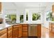 Well-lit kitchen features a large island, stainless steel appliances, and granite countertops at 517 Rider Ridge Dr, Longmont, CO 80504