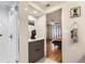 Modern bathroom with a walk-in shower, and a view into the bedroom at 1777 Larimer St # 1908, Denver, CO 80202