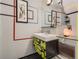 Modern, uniquely designed half-bathroom with geometric decor at 1777 Larimer St # 1908, Denver, CO 80202