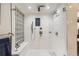 Bright and airy bathroom with a large walk-in shower and bench at 1777 Larimer St # 1908, Denver, CO 80202