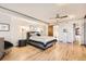 Spacious bedroom with hardwood floors and ensuite bathroom at 1777 Larimer St # 1908, Denver, CO 80202