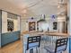 Eat-in kitchen with breakfast bar and modern fixtures at 1777 Larimer St # 1908, Denver, CO 80202