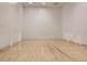 Indoor racquetball court with light colored walls and flooring at 1777 Larimer St # 1908, Denver, CO 80202