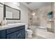 The full bathroom features a soaking tub, and designer fixtures at 975 N Lincoln St # 3E, Denver, CO 80203