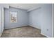 A light-filled bedroom with a large window provides a peaceful retreat at 975 N Lincoln St # 3E, Denver, CO 80203