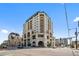 Elegant condo building with Beaux-Arts architecture, balconies and street-level retail space at 975 N Lincoln St # 3E, Denver, CO 80203