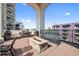 Enjoy the outdoors on this rooftop patio that features a fire pit, dining space, seating, and BBQ grill at 975 N Lincoln St # 3E, Denver, CO 80203