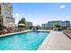 Spend summer days at the building's swimming pool featuring lounge chairs and city views at 975 N Lincoln St # 3E, Denver, CO 80203