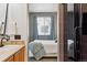 Elegant bathroom showcasing modern fixtures, a tiled shower, and seamless design at 16031 W 63Rd Ln # D, Arvada, CO 80403