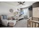 Cozy bedroom featuring a bunk bed, comfortable seating, and playful decor at 16031 W 63Rd Ln # D, Arvada, CO 80403