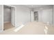 Bright bedroom with carpet and multiple entry points at 4737 E Iliff Ave, Denver, CO 80222
