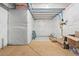 Unfinished basement is ready for customization with exposed pipes and concrete flooring at 8552 W San Juan Ave, Littleton, CO 80128