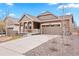 Charming home with a well-maintained front yard, covered porch, and neutral color palette at 8552 W San Juan Ave, Littleton, CO 80128