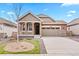 Charming single-Gathering home with a two-car garage and inviting front porch at 8552 W San Juan Ave, Littleton, CO 80128