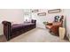 Sitting room with a daybed, accent chair, and natural light from the windows at 8552 W San Juan Ave, Littleton, CO 80128