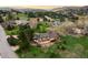 Aerial view showcases the lush property and surrounding landscape at 6491 Crestbrook Dr, Morrison, CO 80465