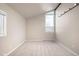 Empty bedroom with vaulted ceilings and large windows that bring in natural light at 6491 Crestbrook Dr, Morrison, CO 80465