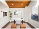 Bright office with wood floors, neutral walls, large windows and contemporary decor at 6491 Crestbrook Dr, Morrison, CO 80465