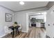 Cozy dining area with a view to the modern, renovated kitchen and attractive vinyl floors at 808 Hanover St, Aurora, CO 80010