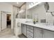 Modern bathroom featuring double vanity and glass enclosed shower at 12258 Hazel Spruce Ct, Parker, CO 80134