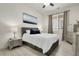 Bright bedroom with plush bedding and modern furnishings at 12258 Hazel Spruce Ct, Parker, CO 80134