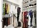 Walk-in closet with organized storage for clothes and shoes at 12258 Hazel Spruce Ct, Parker, CO 80134
