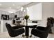 Cozy dining area featuring a modern glass-top table and stylish chairs at 12258 Hazel Spruce Ct, Parker, CO 80134