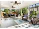 Spacious covered patio with ample seating, ideal for outdoor entertaining at 6303 E Dakota Ave, Denver, CO 80224